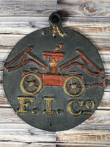 Antique/Vintage Cast Iron F. I. Co Fire Insurance Plaque w/ Red Fire Truck - £75.85 GBP