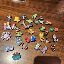 Lot of 30 Jibbitz. Croc charms Marvel Spongebob Disney My Little Pony - $14.65