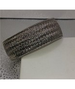 Silver plated woven look hinged bracelet - $34.19 CAD