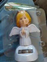 ANGEL christmas /holiday Dancer Sunny Jiggler new in package - £2.33 GBP