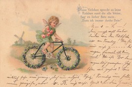 Cherub riding bicycle with flower wheel-windmill in background~1900 POST... - $12.28