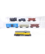 Marx Trains HO Lot 934 Diesel Locomotive, Steam Engine & Tender & 4 freight Cars - $49.49