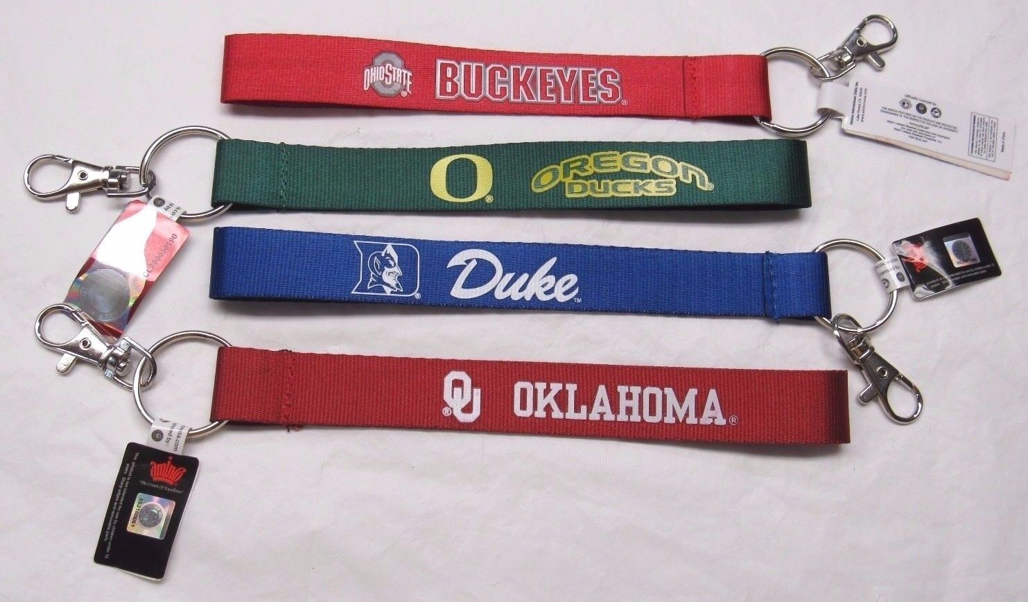 NCAA Wristlet Key Chains 8.5" Long .75" Wide Made by Aminco Select Team Below - $8.99
