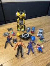 Lot of 10+ Toy Junk Drawer Lot Transformers Thomas Mario PJ Mask Fidget ... - $276.61 MXN