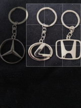 your choice keychains , Honda or Lexus - $148.18 MXN