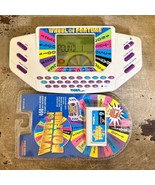 Tiger Electronics Wheel of Fortune Handheld Video Game With Two Cartridges - $18.29