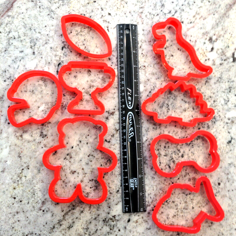 Primary image for Misc Assorted Cookie Cutters Safe Plastic 8 Piece Football Dinosaur Bone Fish...
