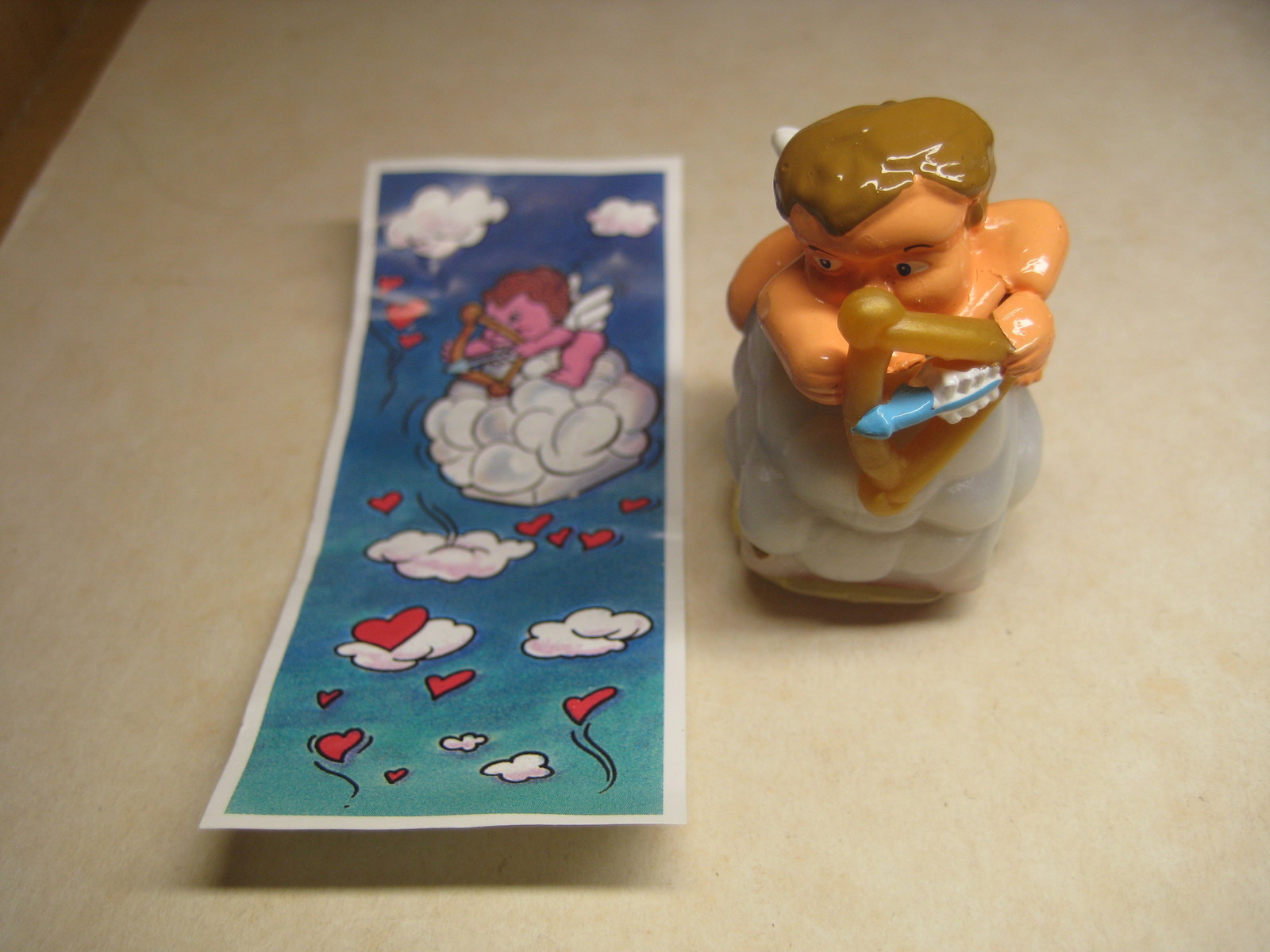 Kinder - K00 119 Cupido - Rubber stamp + paper - Surprise egg - $1.50