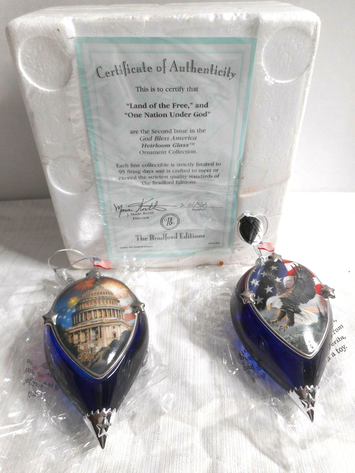 BRADFORD EDITIONS SECOND ISSUE GOD BLESS AMERICA LIQUID FILLED 2 GLASS ORNAMENTS - $33.99