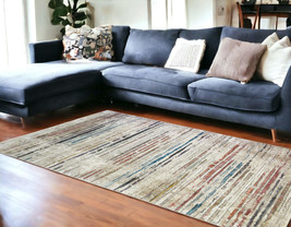 9&#39; X 13&#39; Beige Geometric Distressed Area Rug With Fringe - $1,985.89