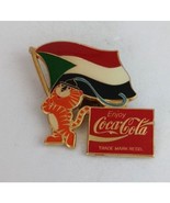 Vintage Coca-Cola Olympic Tiger Holding Sudan Flag Lapel Hat Pin - $15.35