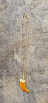 VINTAGE 70&#39;S FAUX AMBER HORN PENDANT WITH GOLD TONE NECKLACE - $30.00