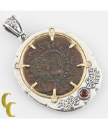 TIBET COIN IN 2 TONE SILVER BEZEL WITH TOURMALINE PENDANT - $25,091.02 MXN