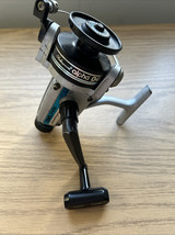 VINTAGE SHAKESPEARE ALPHA 040 SPINNING REEL 2103 SERIES - $294.11 MXN