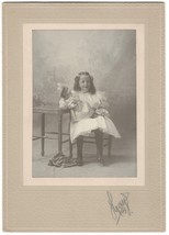 Cabinet Card Photo of Girl with Doll in her lap White Dress at a Table - £6.17 GBP