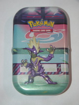 (1) Pokemon (Empty) Mini Tin (1) Art Card (Toxtricity) (1) Metallic Poke... - $12.00