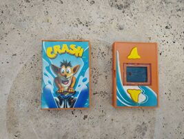 Pocket games from the 1990's, Crash legendary 90's game pocket portable ... - $20.00
