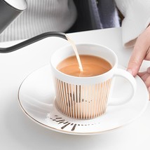 Mirror Anamorphic Cup & Saucer - £29.04 GBP