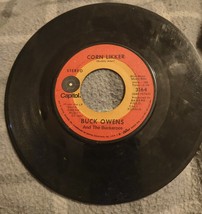 Corn Likker / Rollin&#39; In My Sweet Baby&#39;s Arms Buck Owens 45 RPM Vinyl Re... - $55.21 MXN