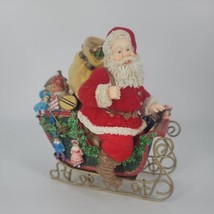 Santa Figurine With Presents on a Sleigh Resin Metal Flocked Coat and Bag  - $9.29