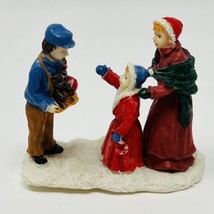 Vintage Xmas Holiday Figurine Village Mother and Child Buying Christmas ... - $12.49