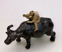 Ceramic Figure Man Ridding on Buffalo  - $14.95
