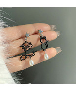 原创S925银针小众趣味黑色镂空设计耳钉不对称珍珠新潮款耳环7424 - $7.33 MXN