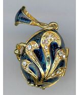 Russian Faux Pendant Dark Blue w/golden swirls w/crystals, inside angel - $995.53 MXN