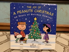 The Joy of A Peanuts Christmas 50 Years of Holiday Comics (2000, Hardcover) - $8.99