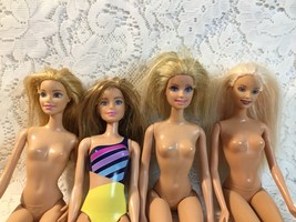4 Barbie Dolls - £6.83 GBP