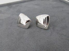 Monet Clip On Earrings Luxury Silver Tone Designer Modernistic Smooth 1&quot; High - £14.38 GBP