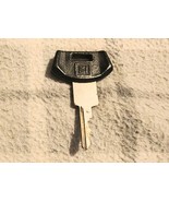 Genuine GM Ignition Door Key  - $184.84 MXN