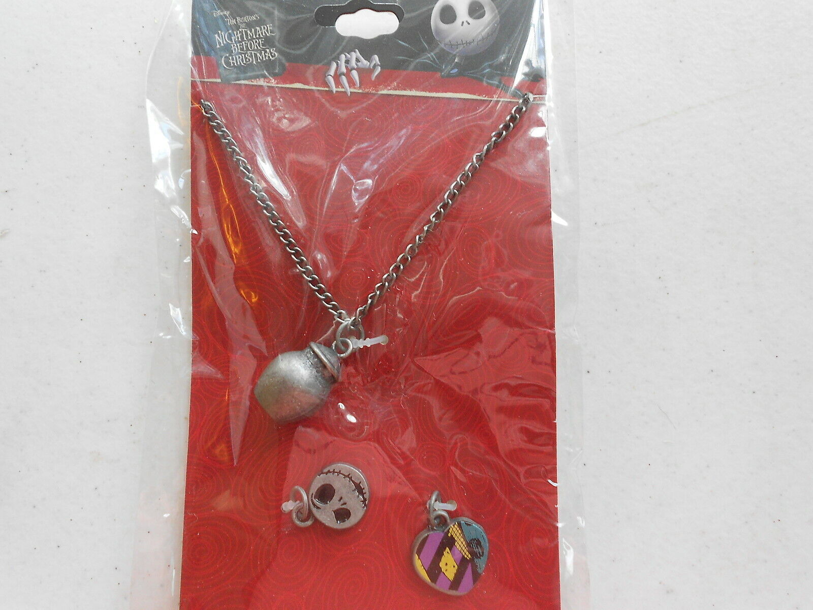 Disney (new) NIGHTMARE BEFORE CHRISTMAS NECKLACE SET (interchangeable charms) - $19.58