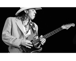 Stevie Ray Vaughan playing guitar in concert with stetson 16x20 Poster - £15.63 GBP