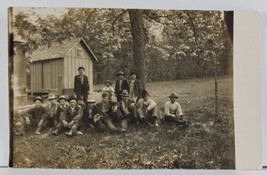 RPPC Handsome Group of Men and Young Boys Rustic Outdoor Cabin Scene Postcard Q7 - £10.35 GBP