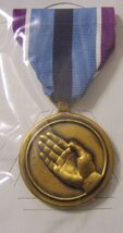 HUMANITARIAN SERVICE MEDAL IN SEALED  CLEAR  PLASTIC PACK - $3.61