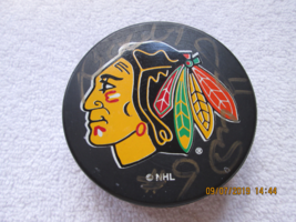 Chicago Blackhawks NHL puck, Bobby Hull #9 autographed, no COA - $25.00