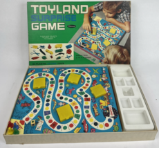 Vintage WHITMAN Games 1966 TOYLAND SURPRISE Board Game w Action Toys - $29.69