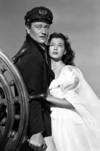 John Wayne and Gail Russell in Wake of the Red Witch posing by wheel 18x24 Poste - £18.95 GBP