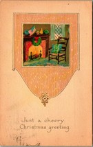 Just A Cheery Christmas Greetings Fireplace Scene Chair Wreath 1919 Postcard H31 - $3.91