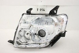 New OEM Xenon Headlight HID Head Light Lamp Mitsubishi Montero Pajero 07... - £349.52 GBP