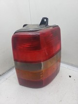 Driver Left Tail Light Fits 93-98 GRAND CHEROKEE 704317 - $500.38 MXN