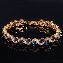 Design Trendy Gold Color White Cubic Zirconia Stone and Dark Blue Crystal Bracel - £16.15 GBP