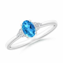 ANGARA Solitaire Oval Swiss Blue Topaz Ring with Trio Diamond Accents - £602.20 GBP