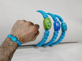 Scarab bracelet. Egyptian scarab and wool bracelet, adjustable size. Sca... - £22.72 GBP