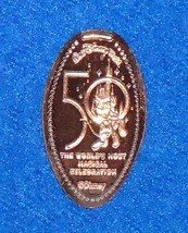 Disney 50th anniversary castle penny   pluto 1 thumb200