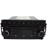 09 10 Dodge Chrysler Jeep AM/FM 6 disc CD DVD radio receiver OEM 05064941AD - $1,631.30 MXN