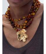 Multi-Layered Beaded Necklace with Golden Leaf Pendant - $23.84