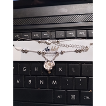 New in package silver rose anklet bracelet - $14.85