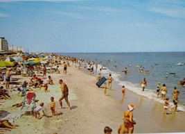 Rehoboth Beach Delaware Postcard Rafting Swimmers Sun Bathers Beach Ocean - £9.90 GBP